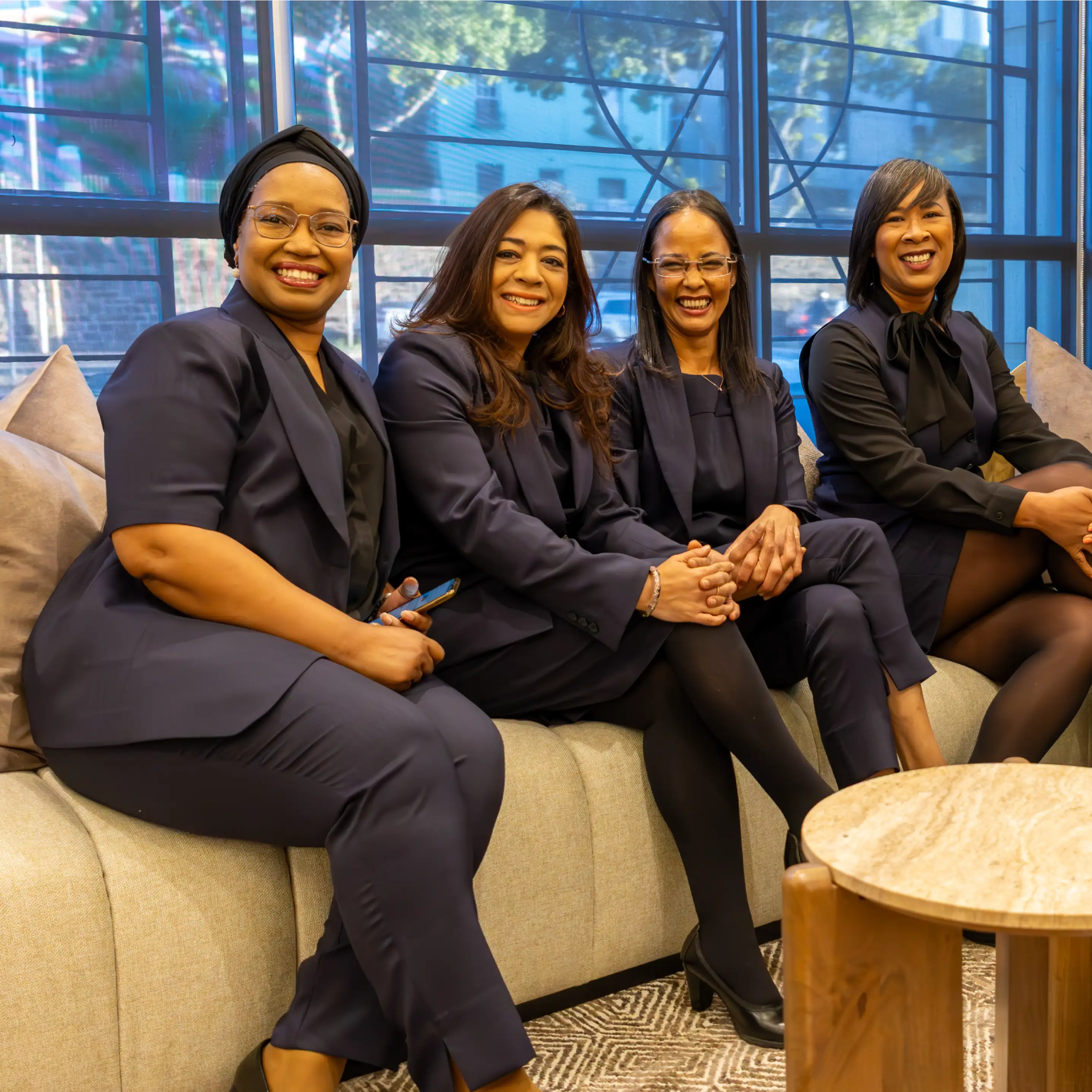 Staff from Afrogem Wearing Navy Workwear For Teams by Imagemakers Cape Town