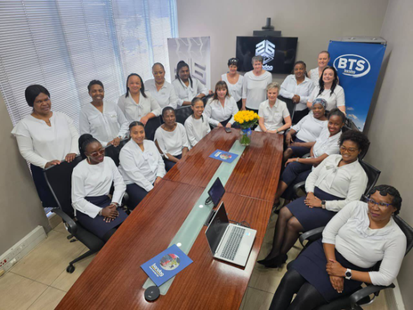 Women in Coordianted Corporate Uniforms for Teams by Imagemakers