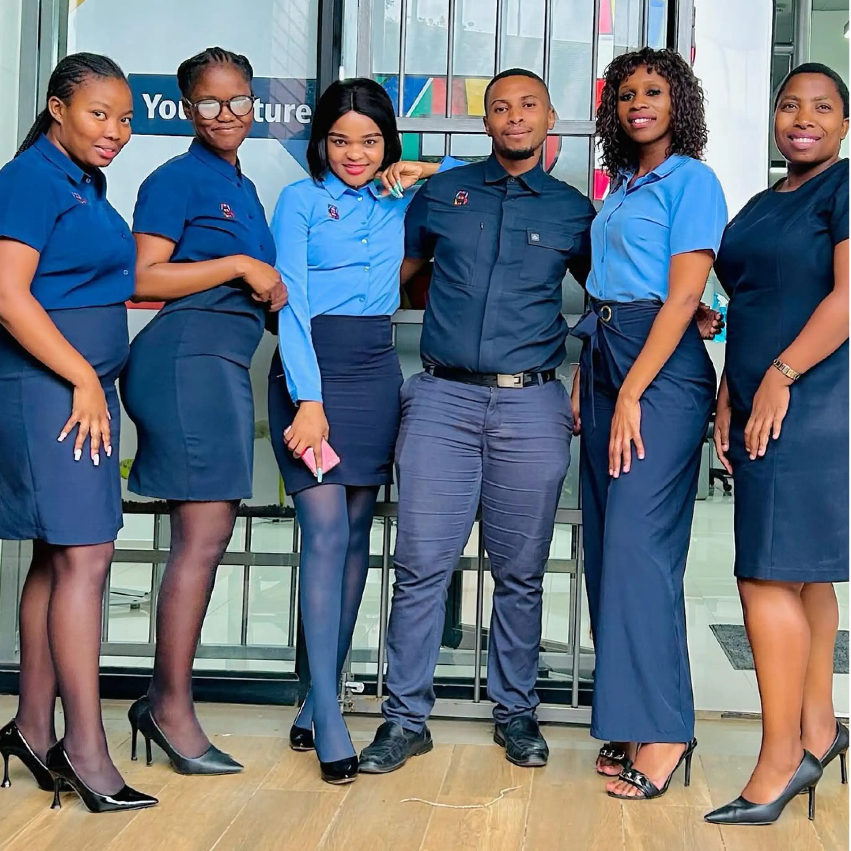 Men's and Womens Workwear Team in Smart Corporate Skirts and Dresses by Imagemakers 