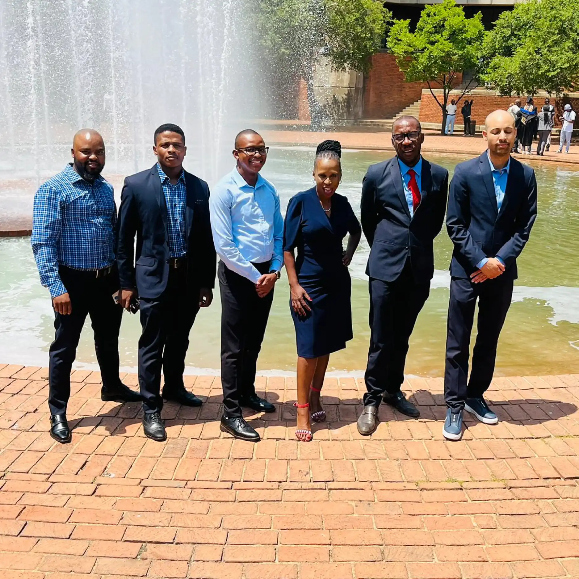 Women and Men Team Wearing Imagemakers Navy Corporate Blazers and Uniforms