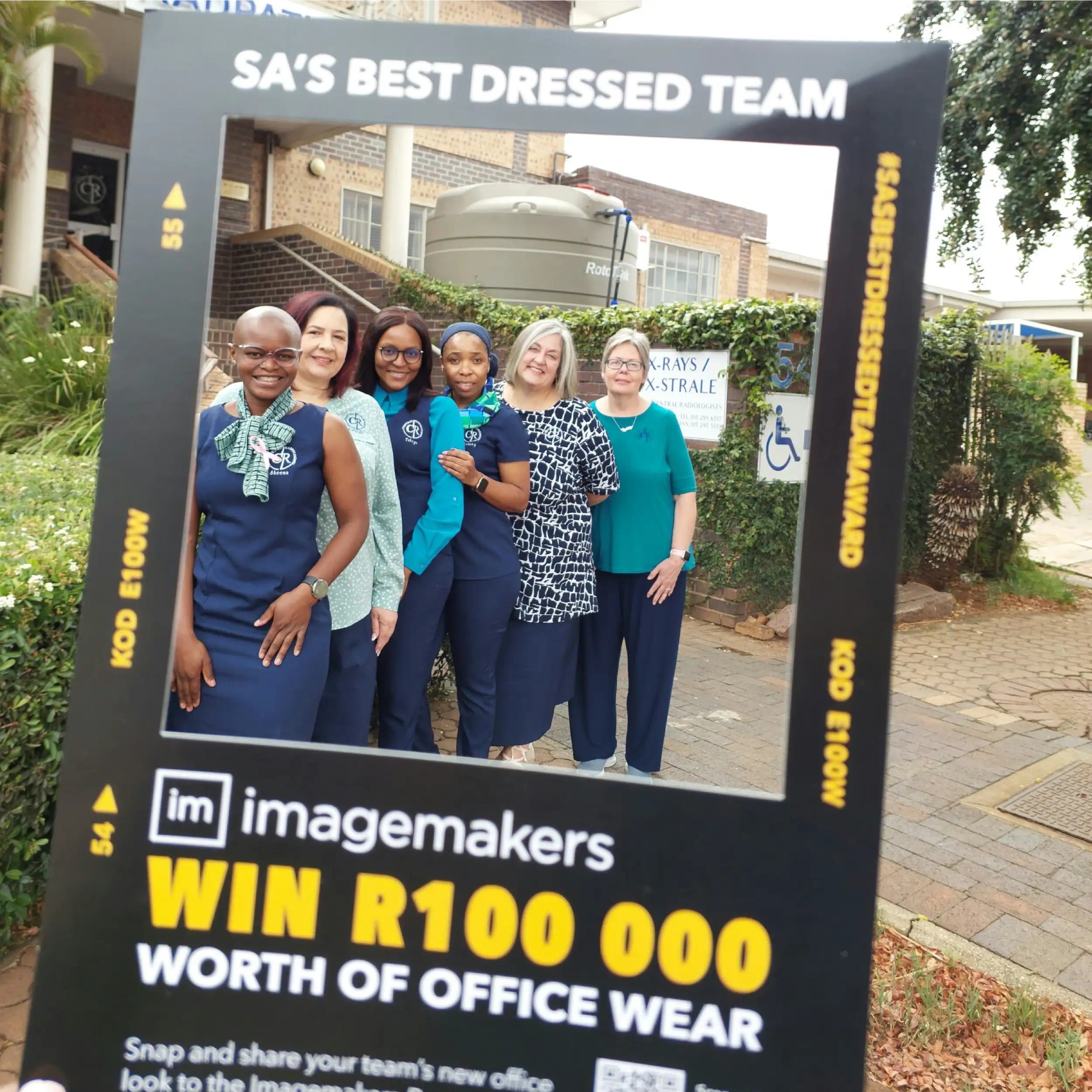 Cenrad Admin Team Women Wearing Imagemakers Premier Tops and Navy Corporate Dresses