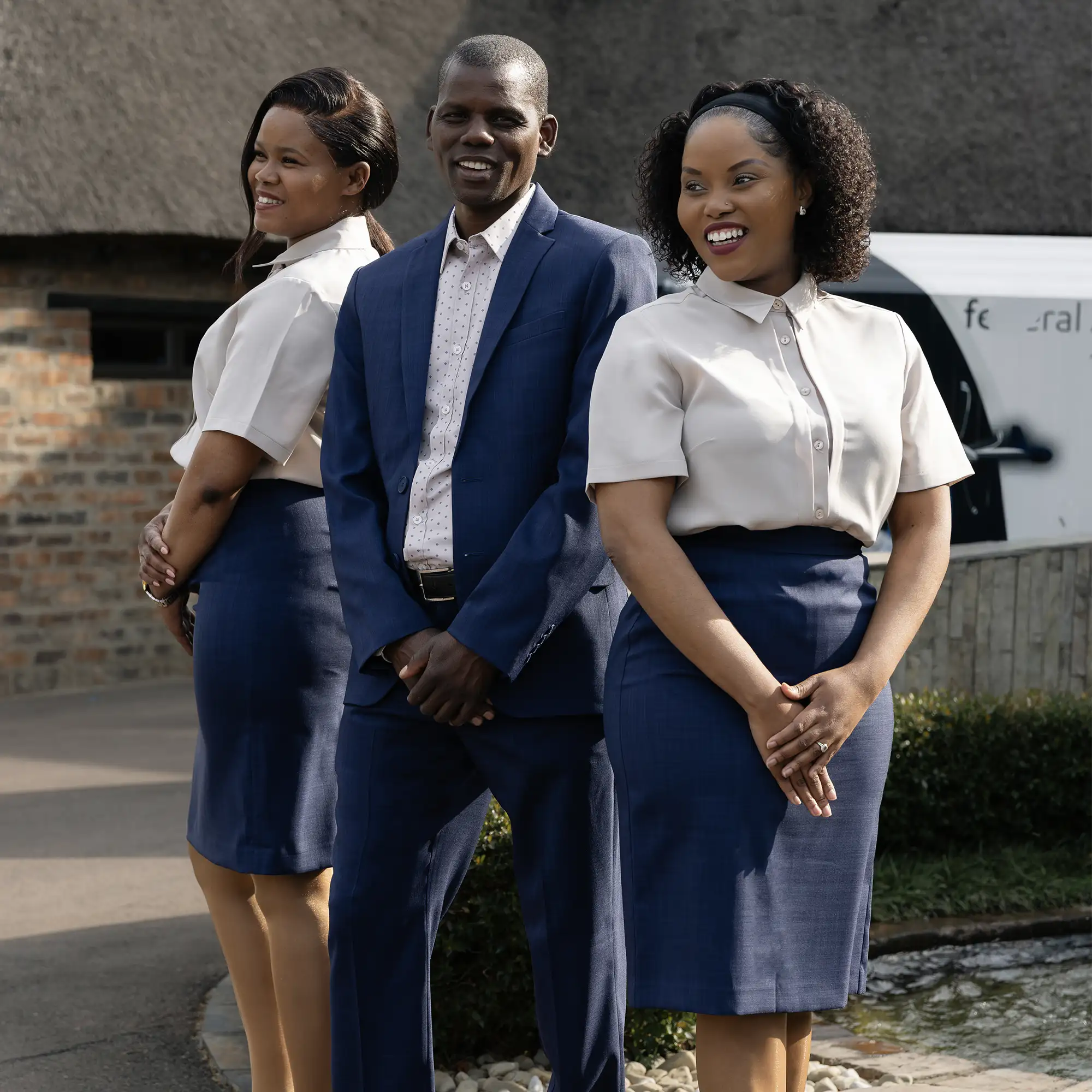Federal Airlines team wearing corporate uniforms by Imagemakers