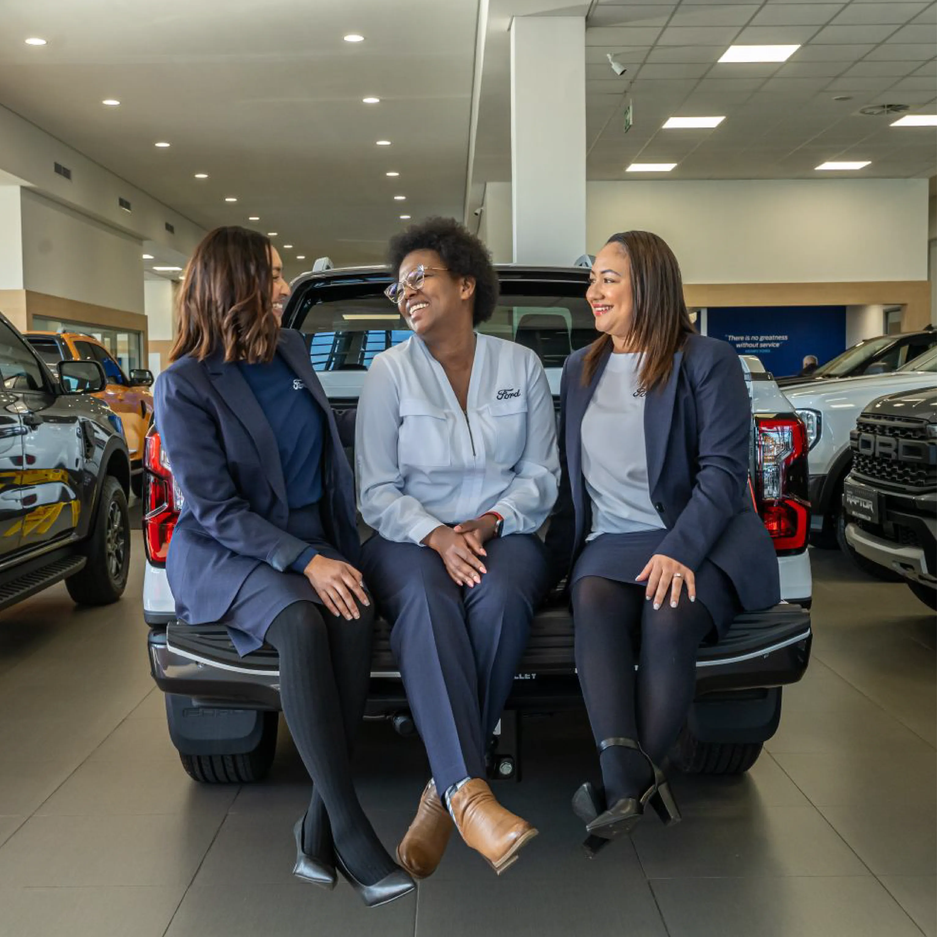 Ladies dressed in Navy Blue Office Wear Supplied by Imagemakers