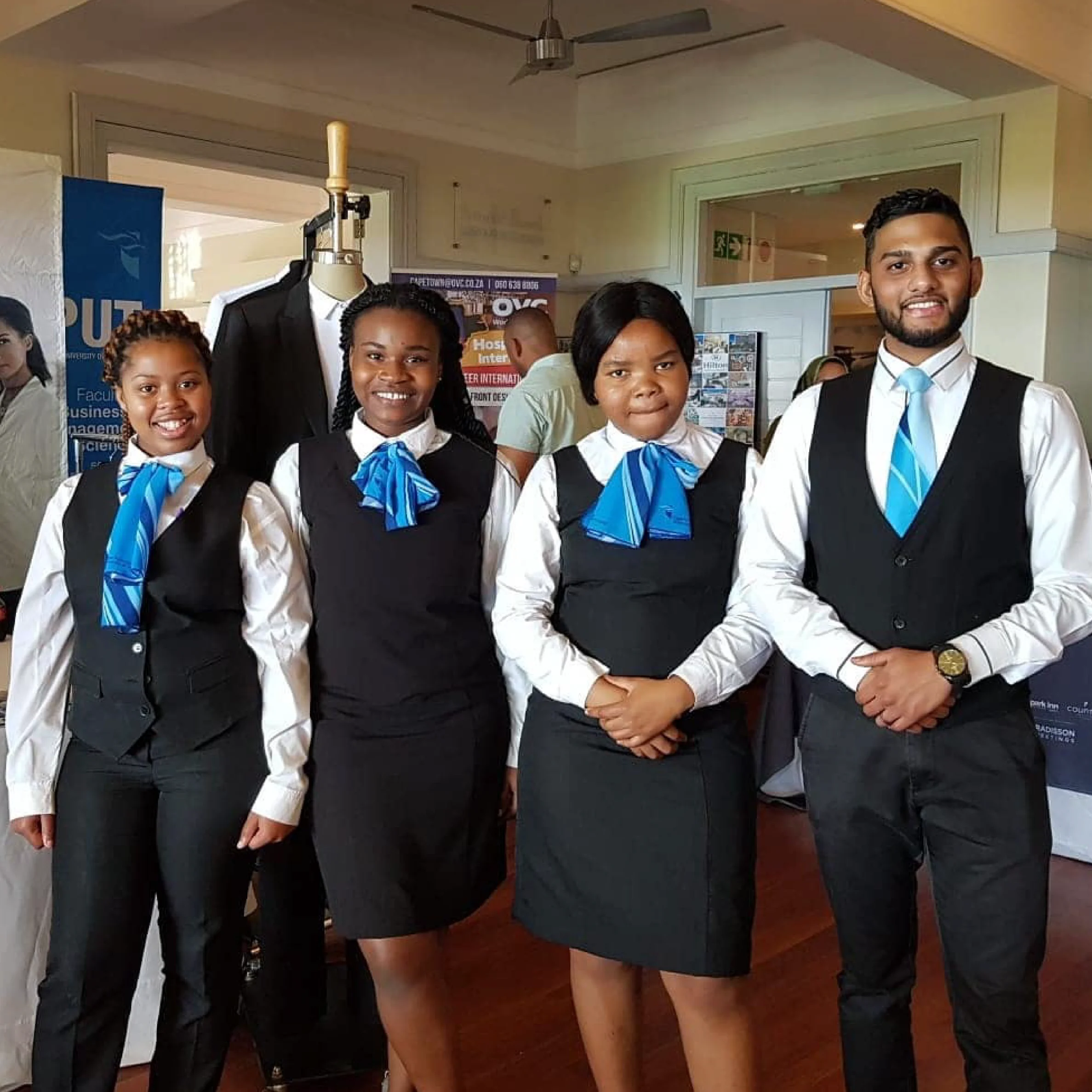 Cape Town Hotel School Men's And Ladie's Staff Wearing Black And White Uniforms From Imagemakers
