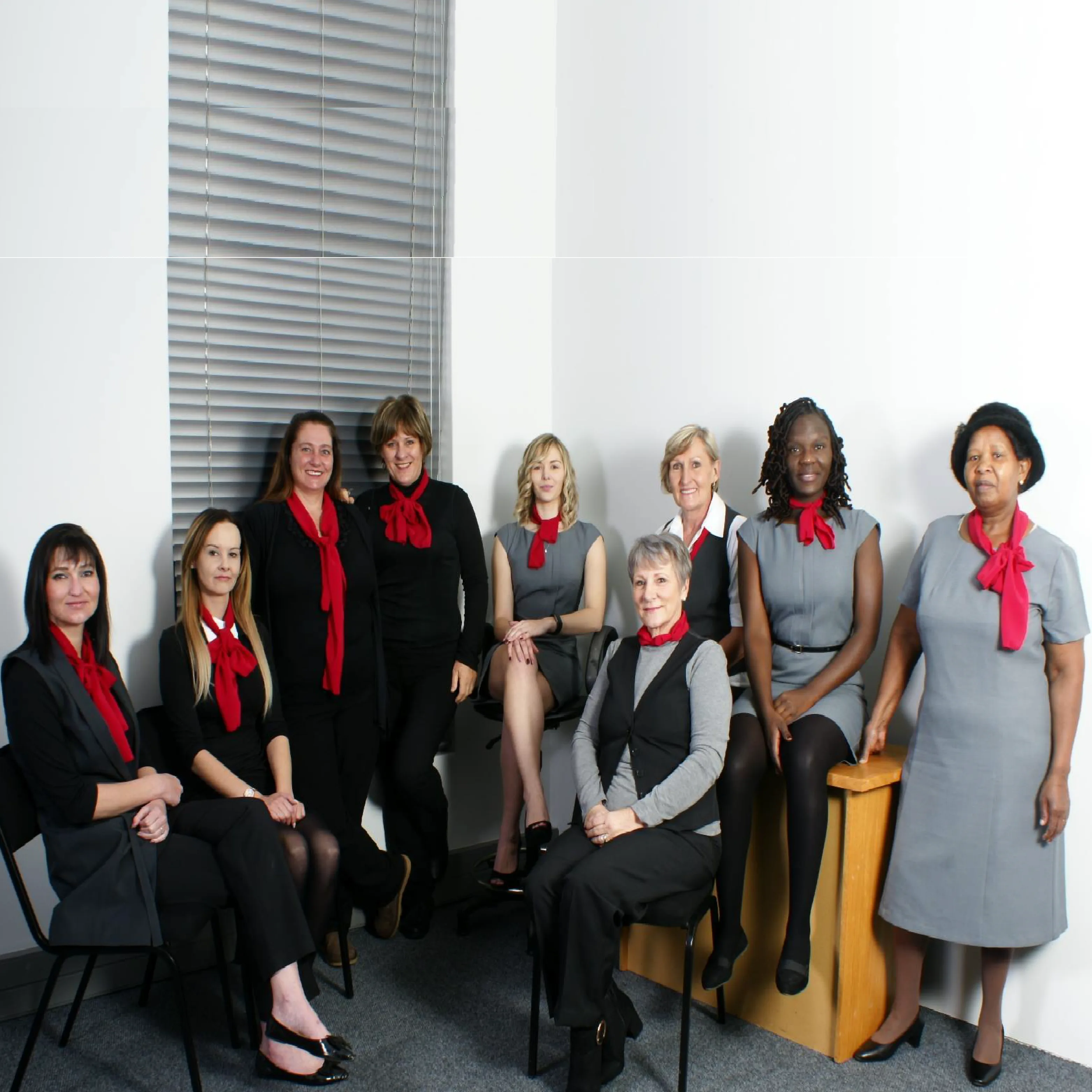 Group of Admin Staff in Grey and Black Office Clothing for Teams by Imagemakers