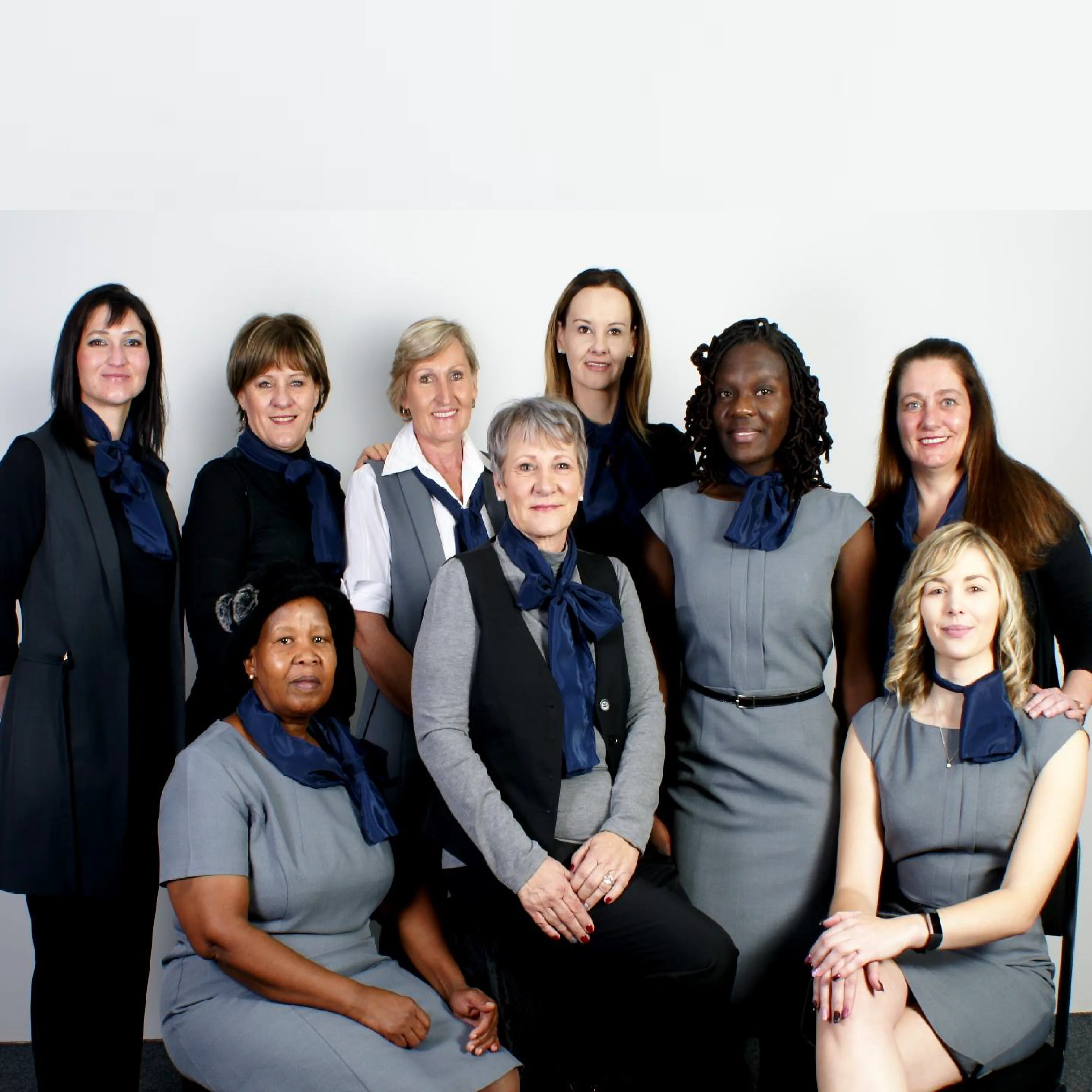 Ladies Wearing Grey Corporate Staff Uniforms by Imagemakers