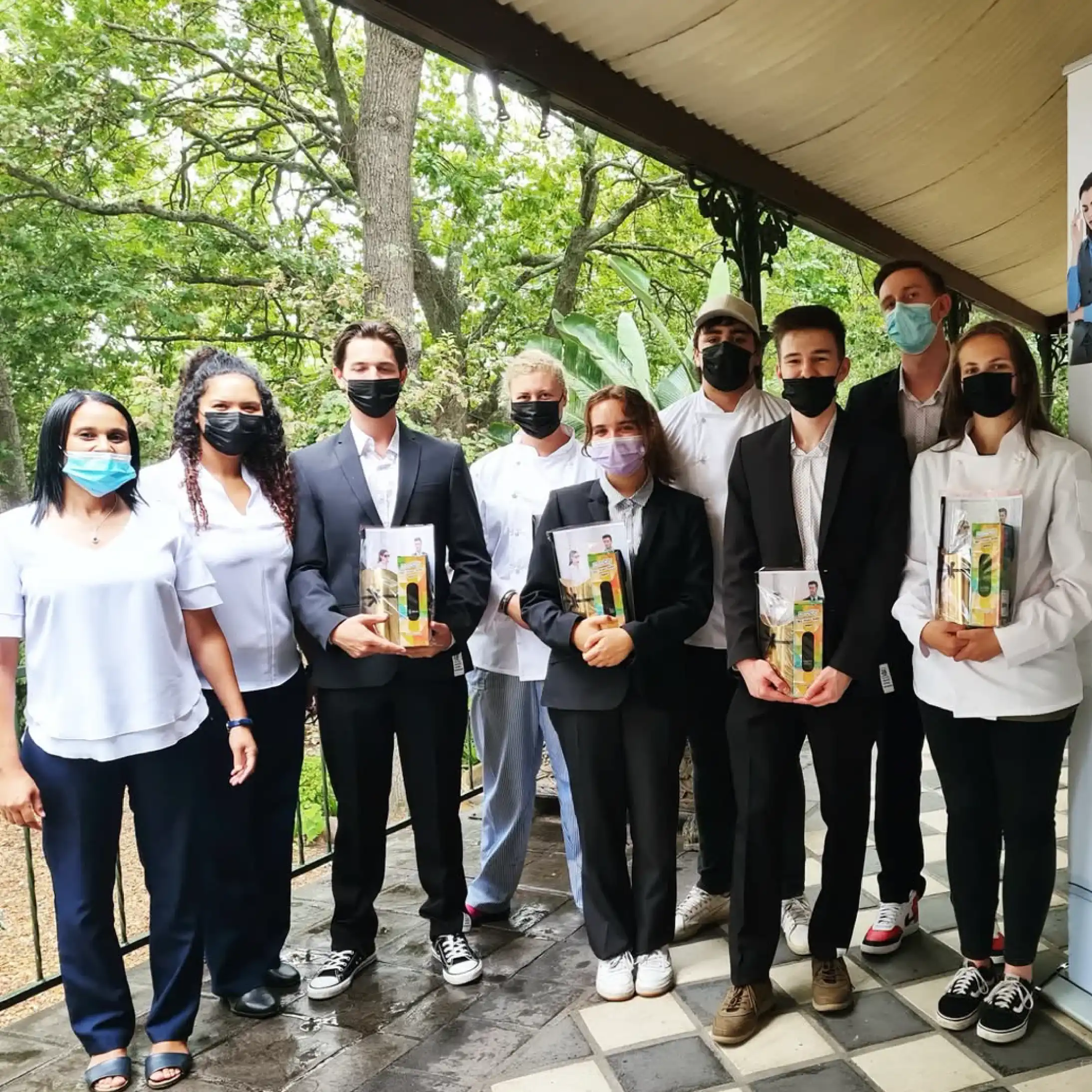 Professional Women and Men dressed in Black and White Corporate Workwear for Teams