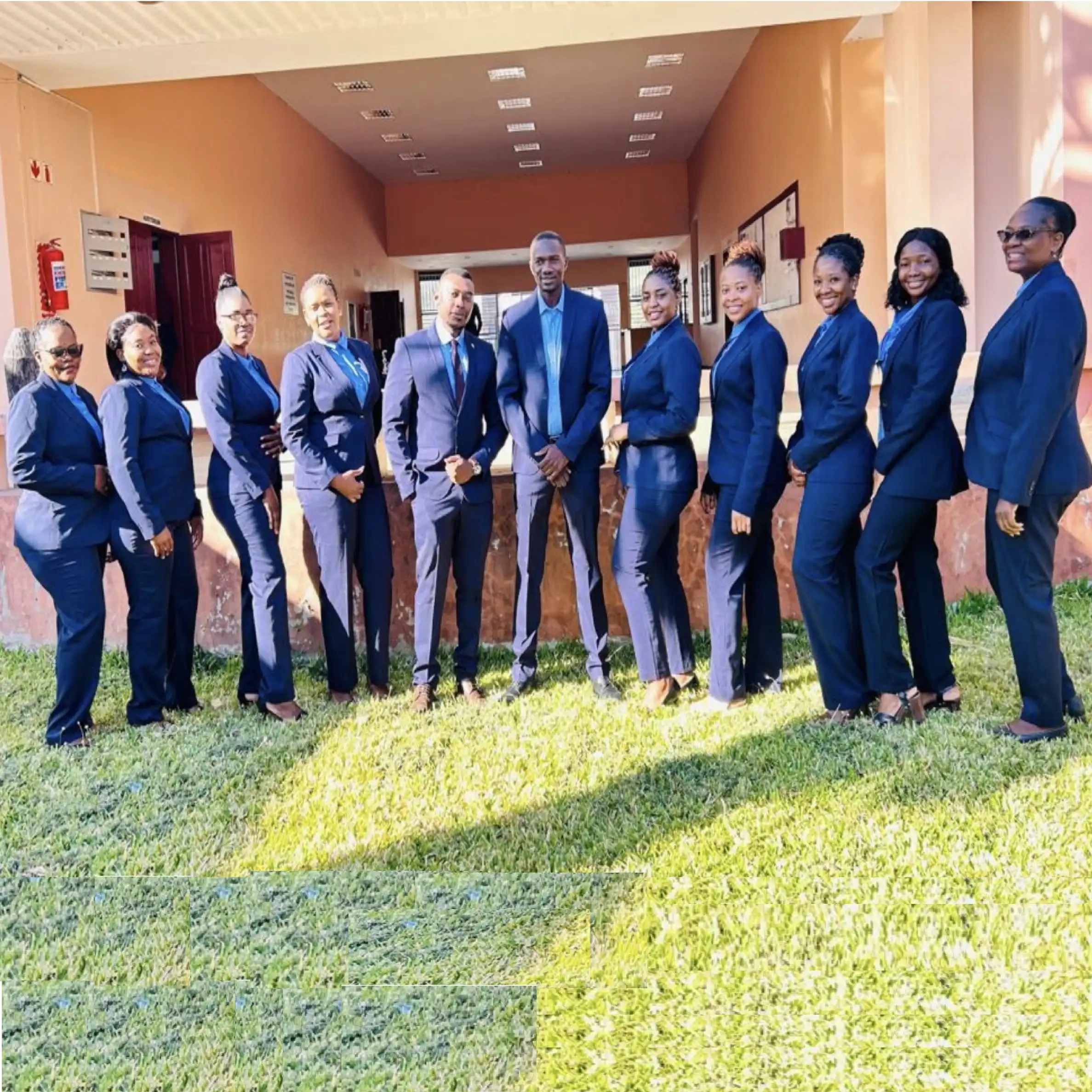 Team of Ladies and Men Wearing Blue Corporate Blazers and Clothing Supplied by Imagemakers