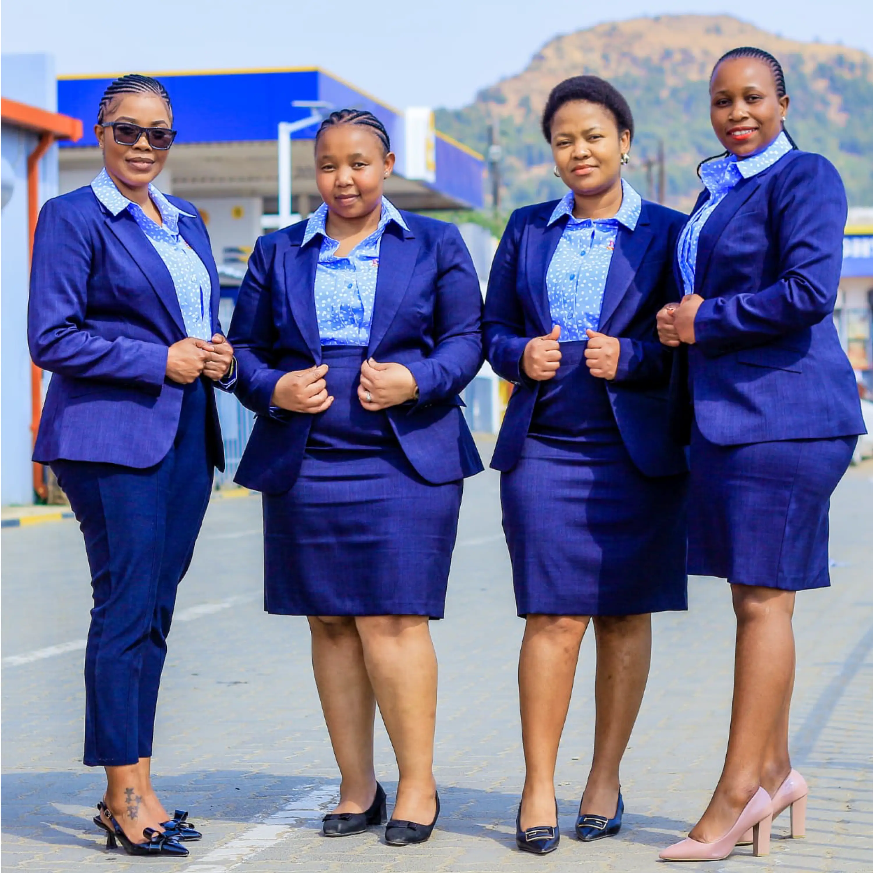 Ladies in Professional Corporate Dresses and Team Blazers by Imagemakers