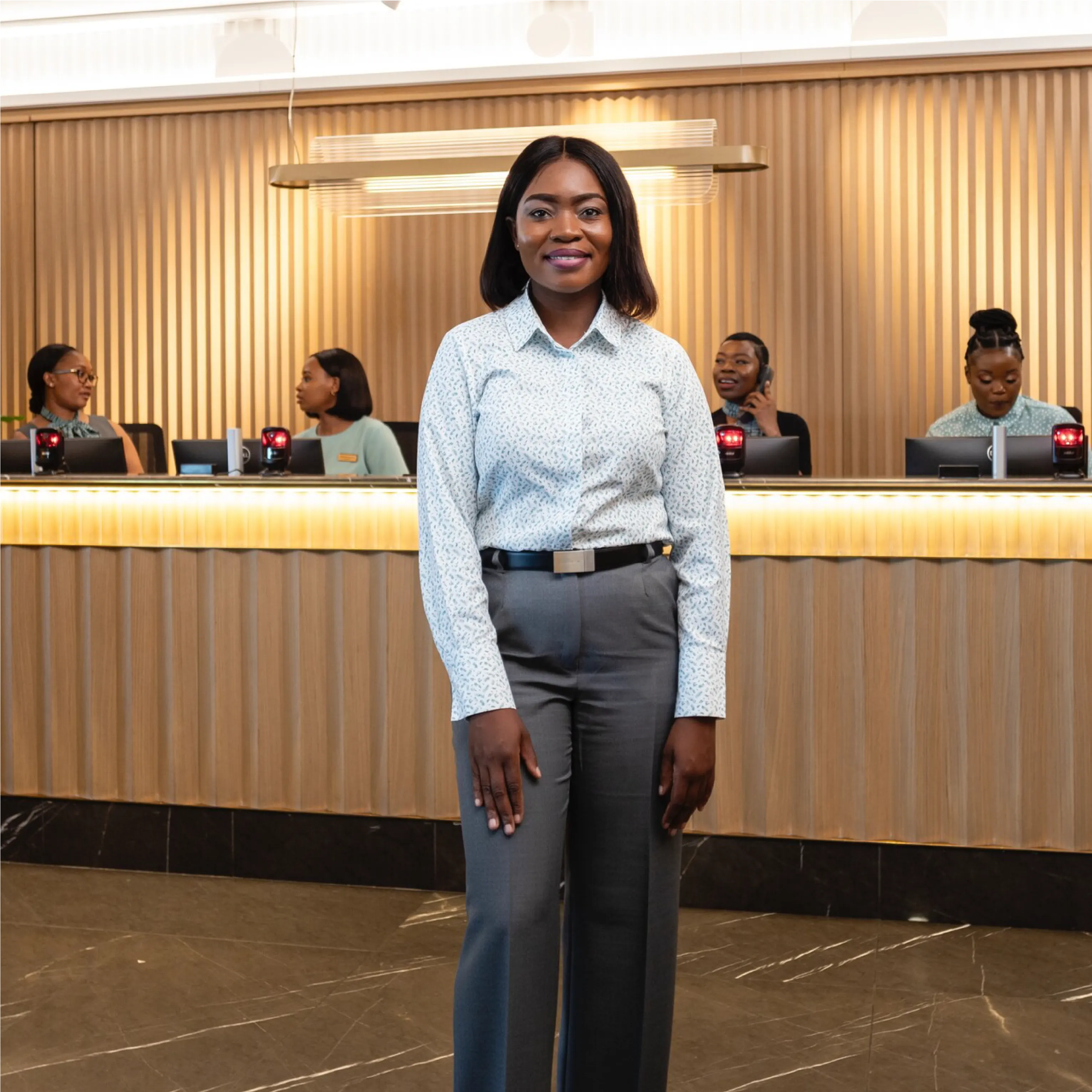 Lady from Slow Lounge Wearing White and Grey Corporate Wear by Imagemakers Corporate Fashion