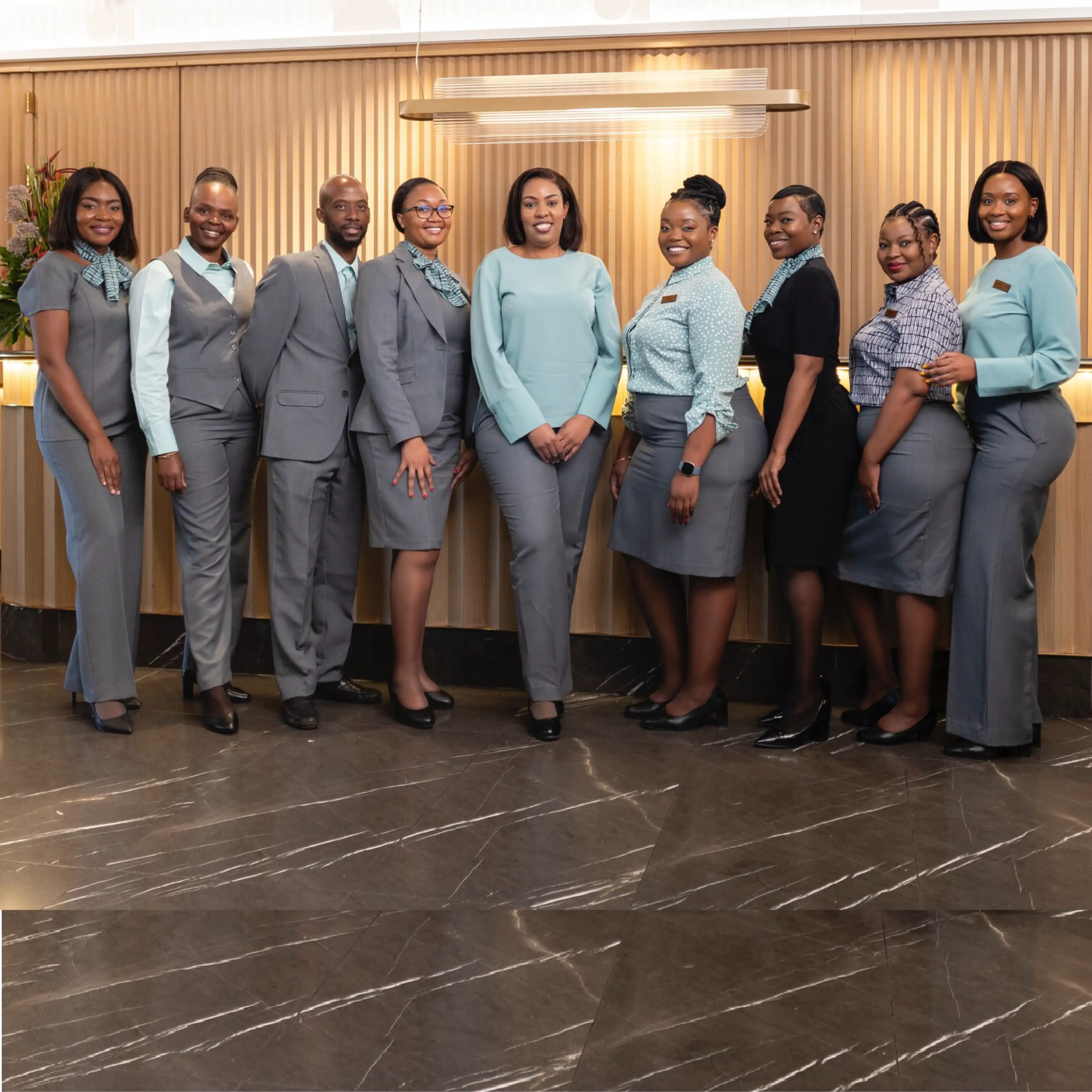 Slow Lounge Staff Wearing Imagemakers Grey and Black Staff Uniforms
