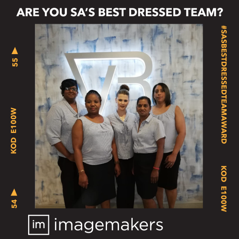 Wearing Professional Grey and Black Work Uniforms, the VR Printers Team is Supplied by Imagemakers Corporate Uniforms Catalogue 