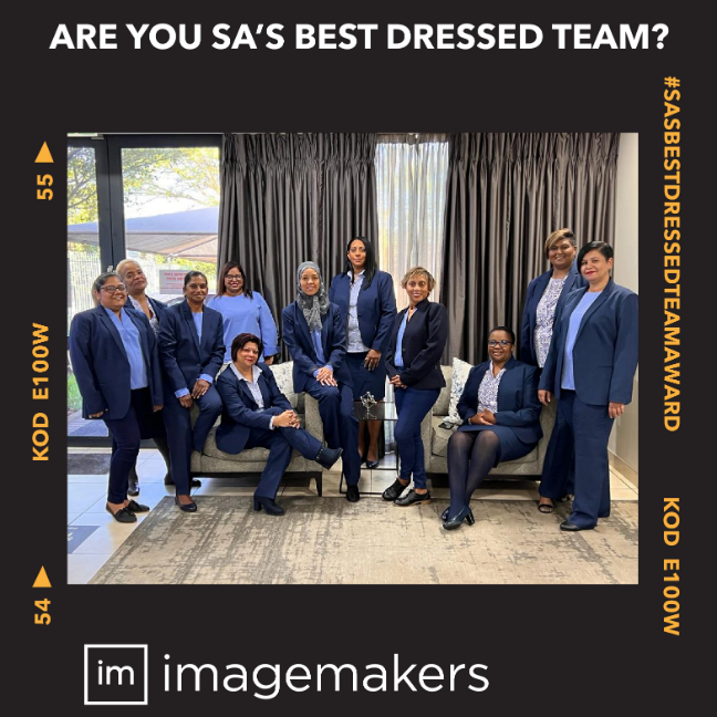 VR Printers Team Wearing Coordinated Navy Team Clothing, dressed by Imagemakers Office Uniform Suppliers