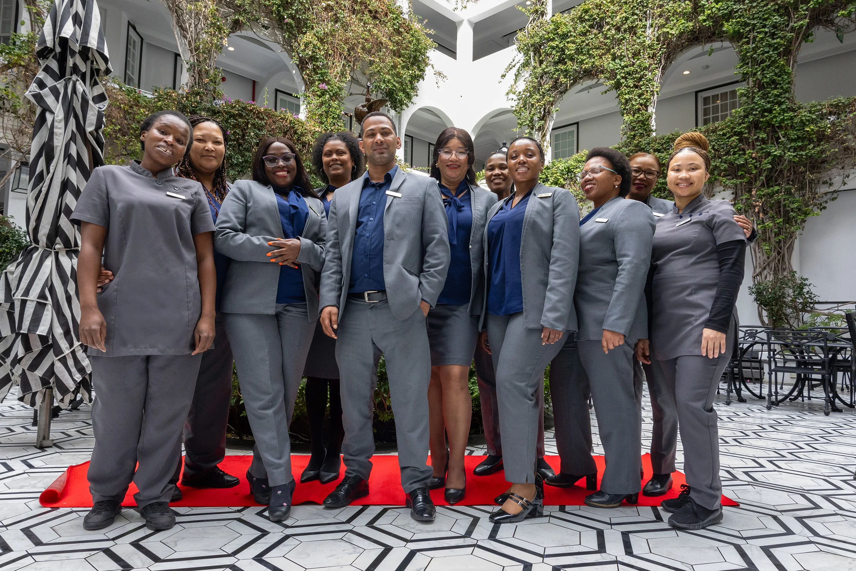 Ladies and Mens Corporate Wear in Grey and Navy for Hospitality by Imagemakers